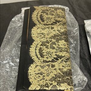 Avon Black and Gold Lace Clutch